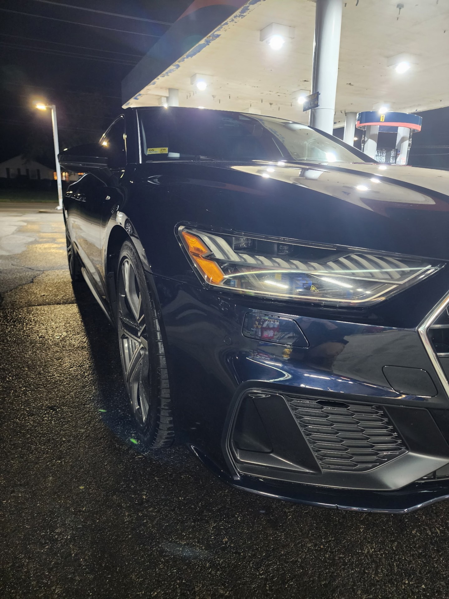 Blue Audi A7 headlight detail